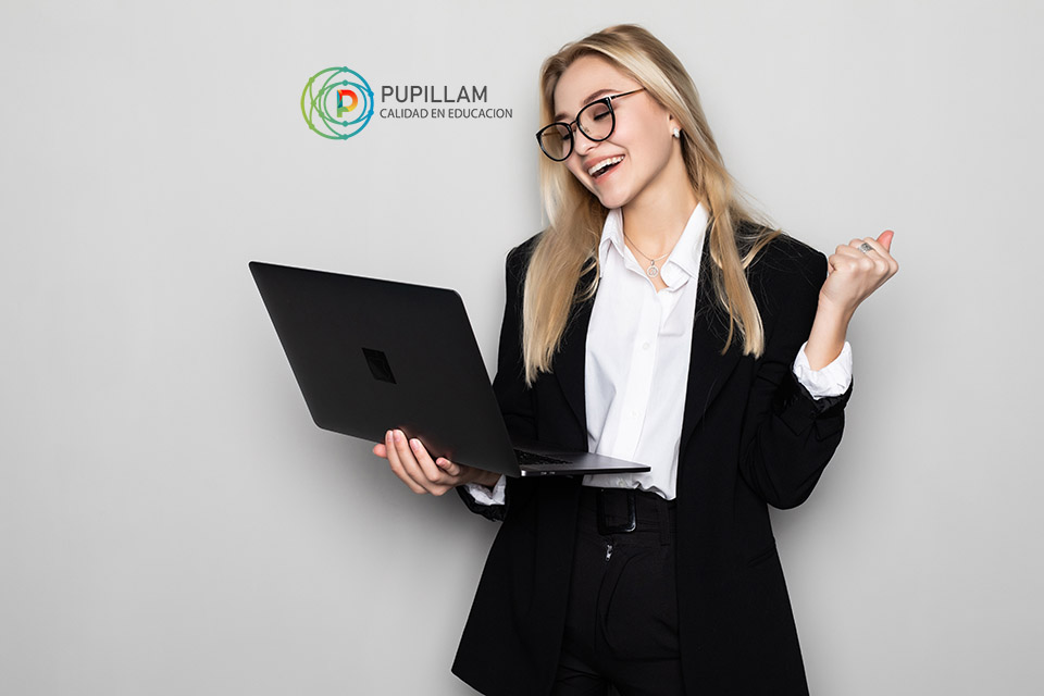 Beautiful young woman working using computer laptop over white background very happy and excited doing winner gesture with arms raised, smiling and screaming for success. Celebration concept.